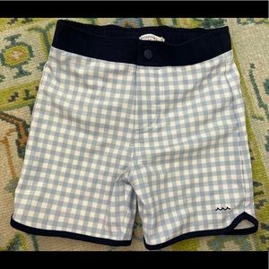 NWT. Minnow blue gingham swim trunks. Size 9/10